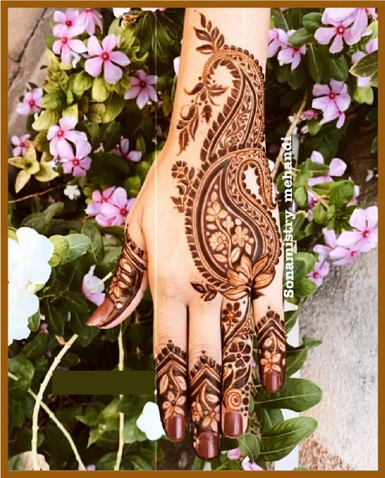 Stylish Back Hand Peacock Design With Curls Stylish Back Hand Mehndi Design
